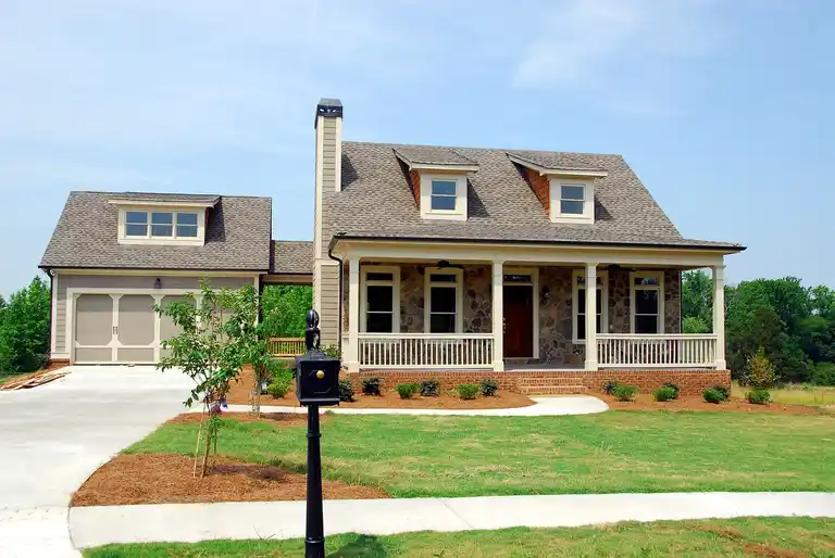 Grey House With Black Door